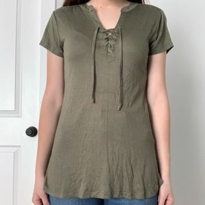 Thin tight shirt with lacy v-neck design